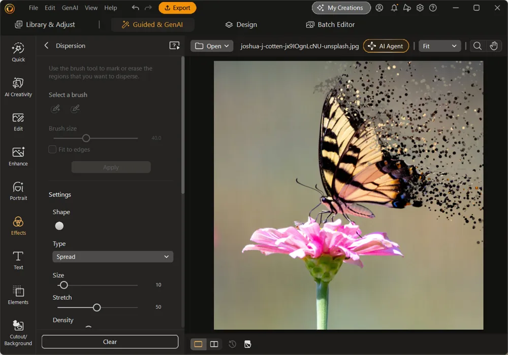 The marked area of the wing broken into particles, with the Settings panel now active