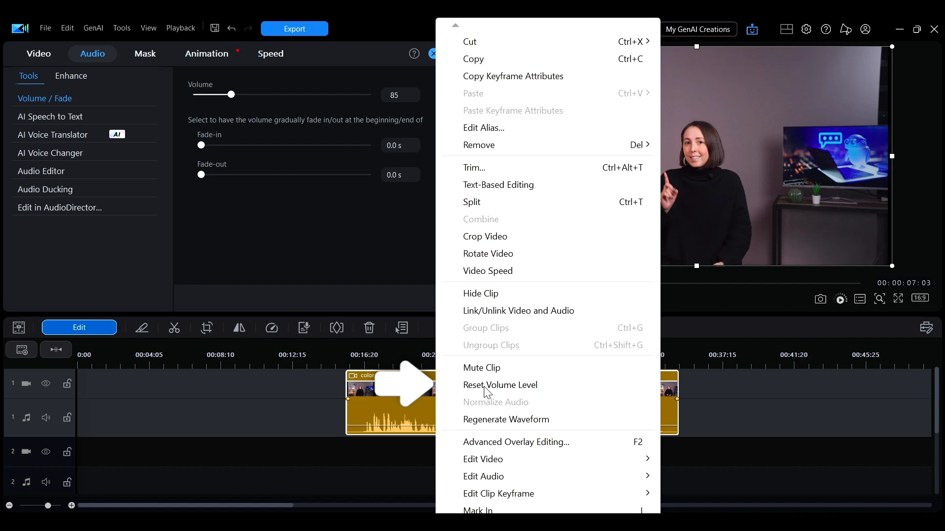 The right-click menu on a PowerDirector timeline clip with Reset Volume Level indicated.