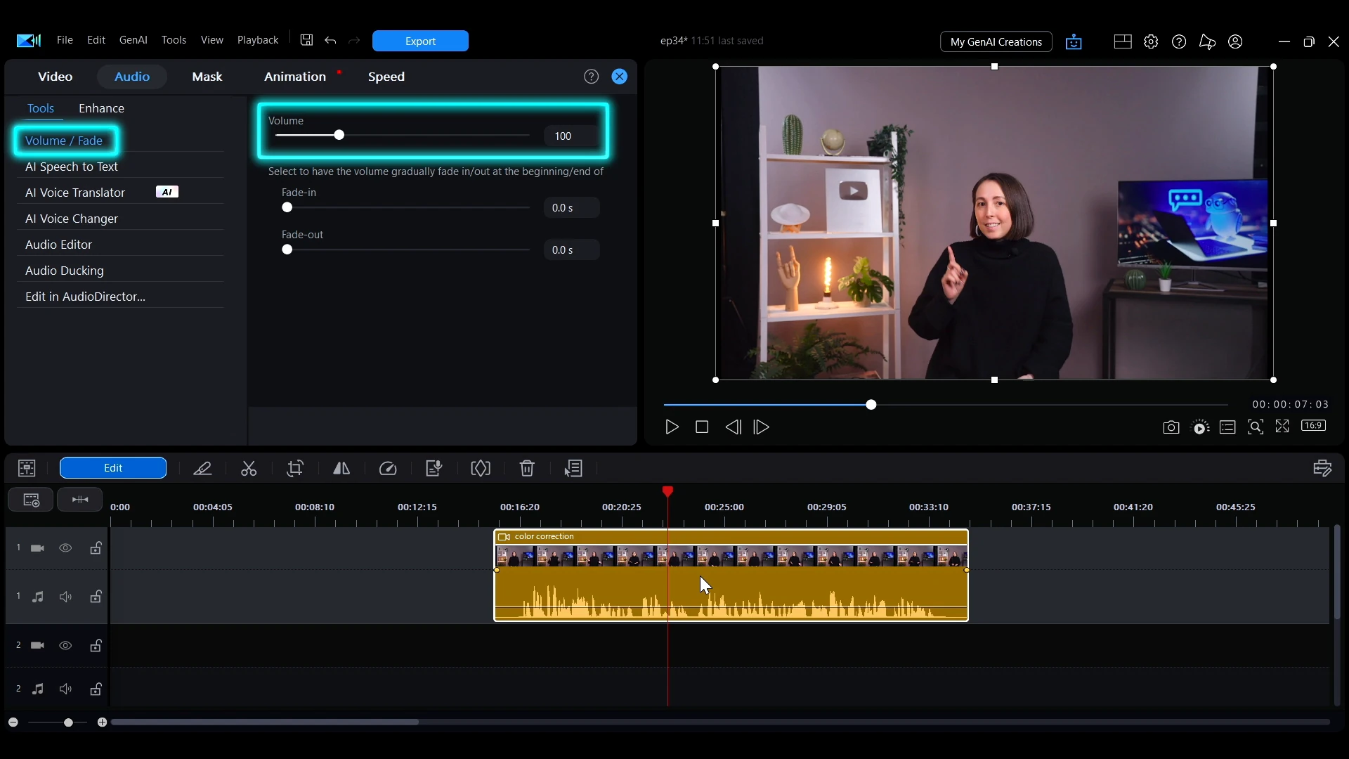 The Volume / Fade panel open on the Audio tab in PowerDirector with its fade slider highlighted.