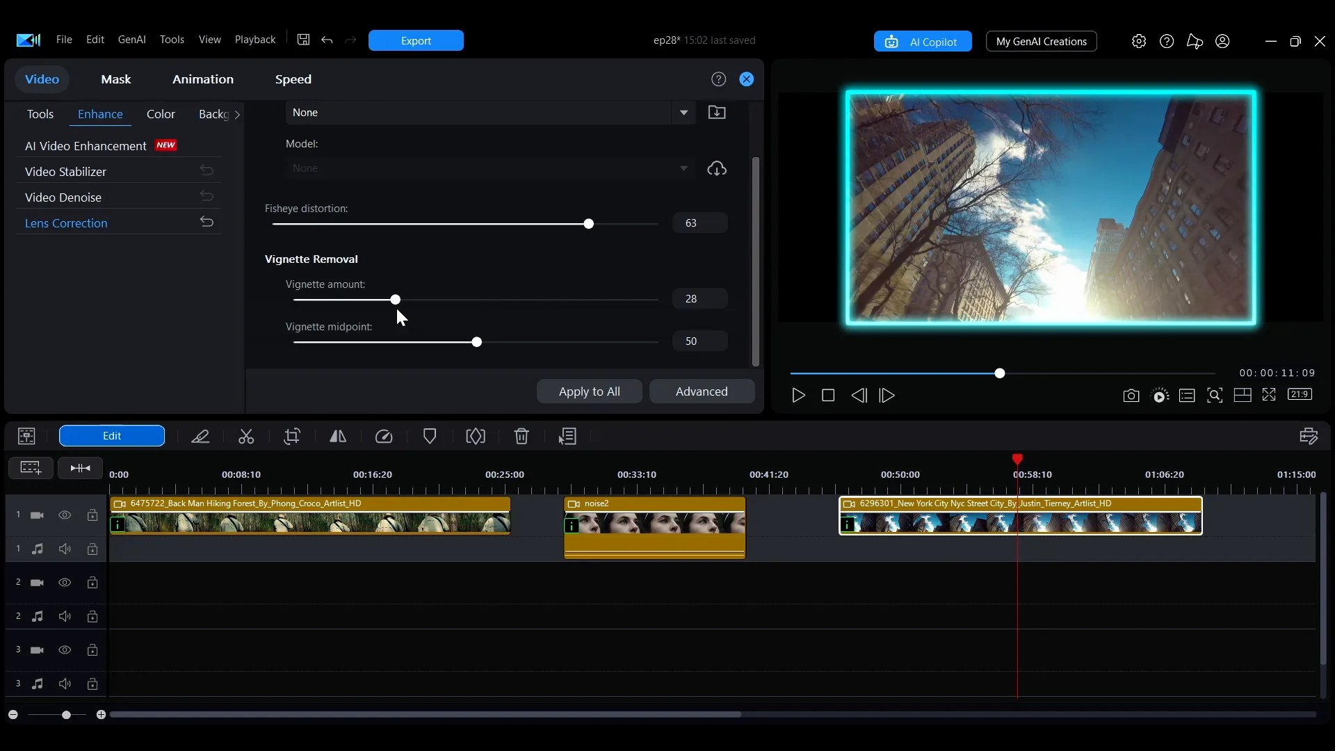 The Lens Correction panel in PowerDirector with a Model dropdown, a Fisheye distortion slider, and Vignette amount and Vignette midpoint sliders under a Vignette Removal heading.
