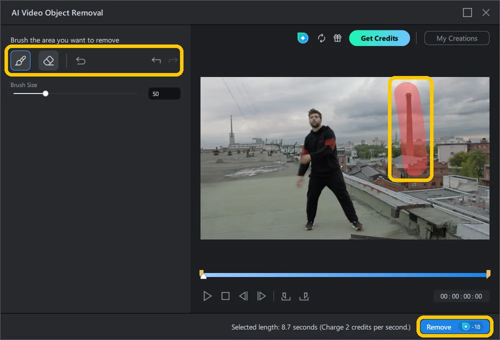 AI Video Object Removal window with a red brush mask covering the chimney, the brush and eraser row highlighted, and the Remove button highlighted