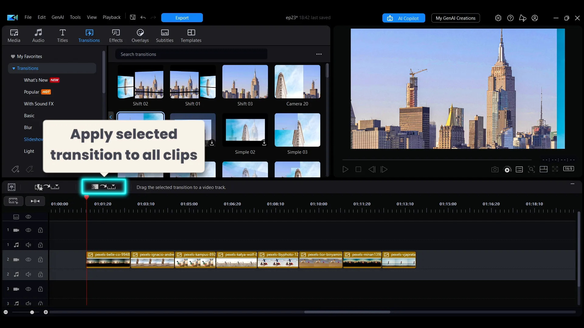 The PowerDirector timeline with the button that applies the selected transition to all clips on the track.