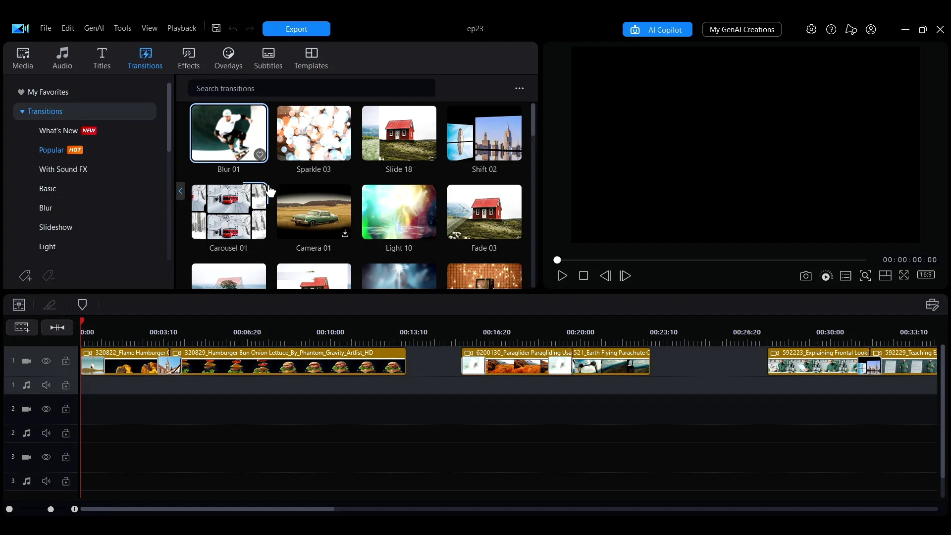 The Transitions tab in PowerDirector, with the category list on the left and a grid of transition thumbnails.