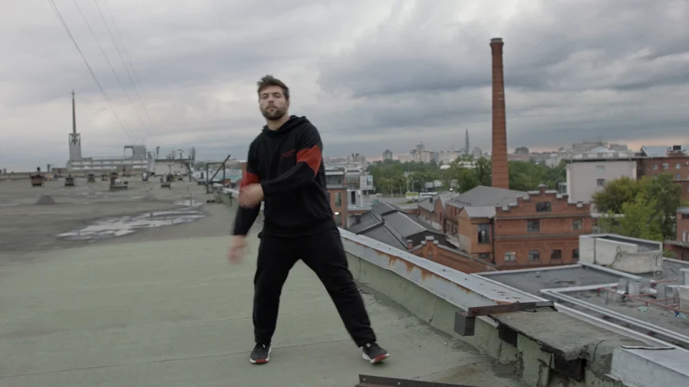 The original rooftop clip, filmed under flat gray overcast cloud