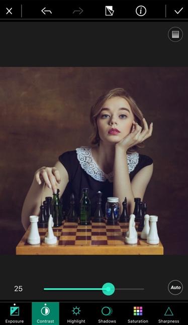 Photo in a photo editing app of a woman playing chess
