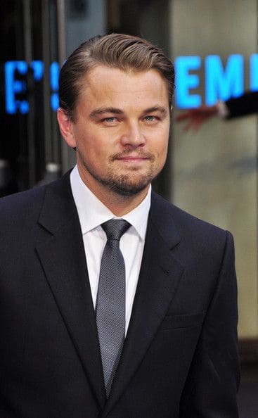 Side part short hairstyle for men with natural volume