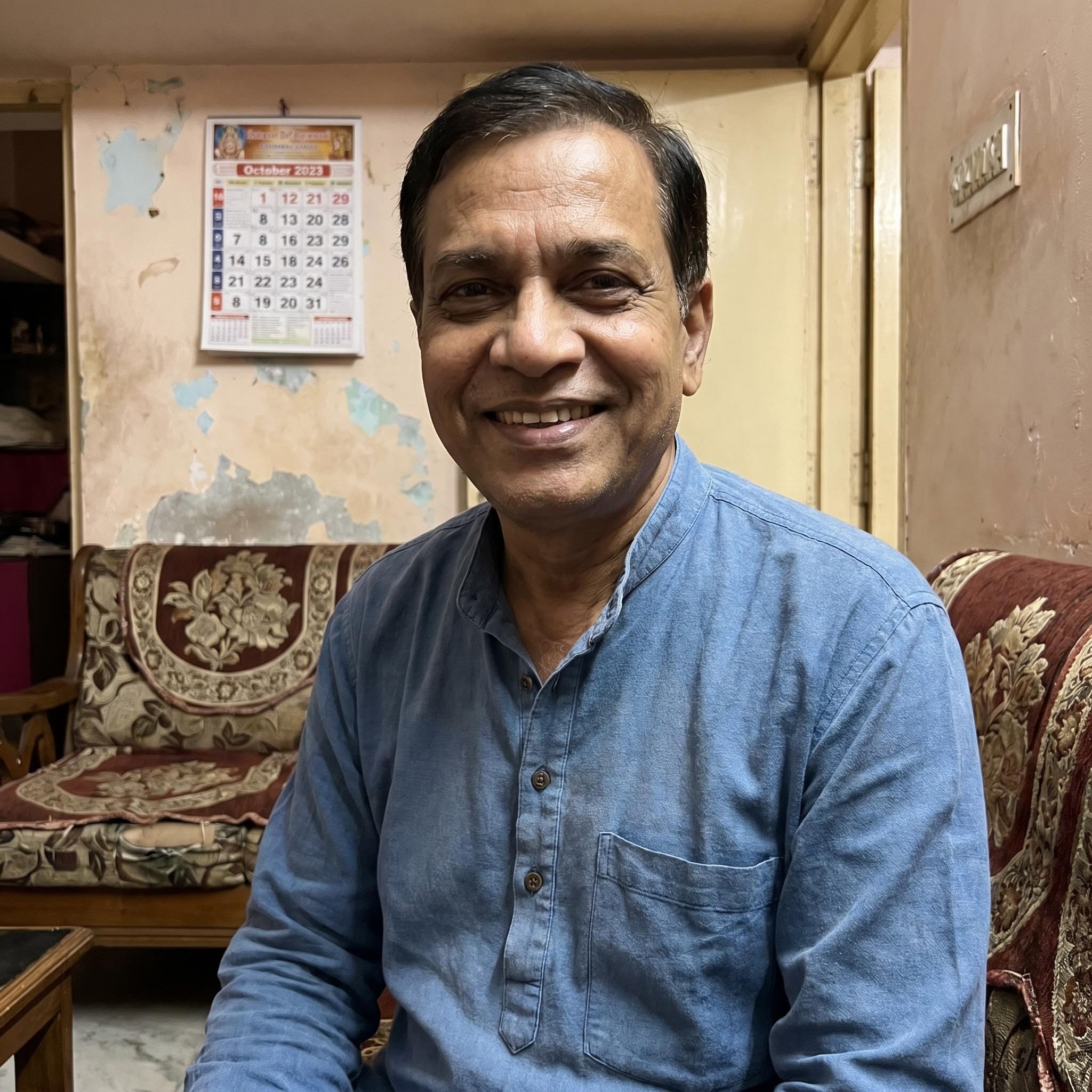 Reference photo of dad before Indian neon celebration scene