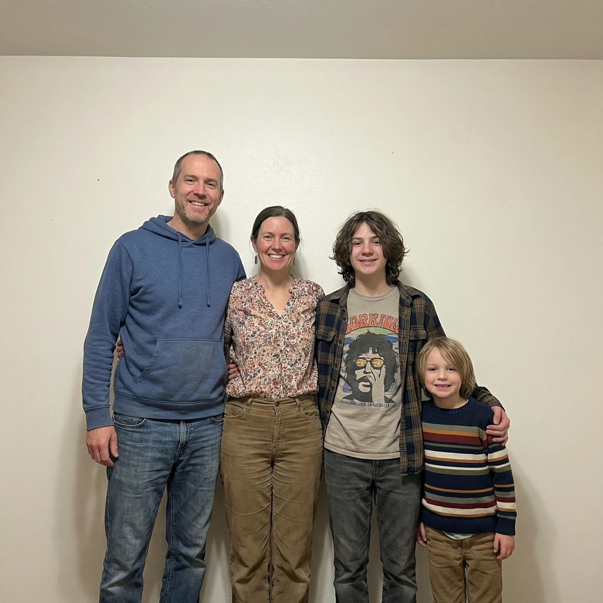 Original family photo before AI minimalist studio transformation