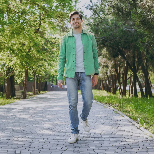 The park photo in full color with the jacket changed from orange to green