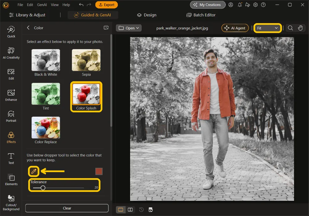 Color Splash, the dropper button, the Tolerance slider at 20, and the Fit zoom box highlighted, with only the orange jacket in color