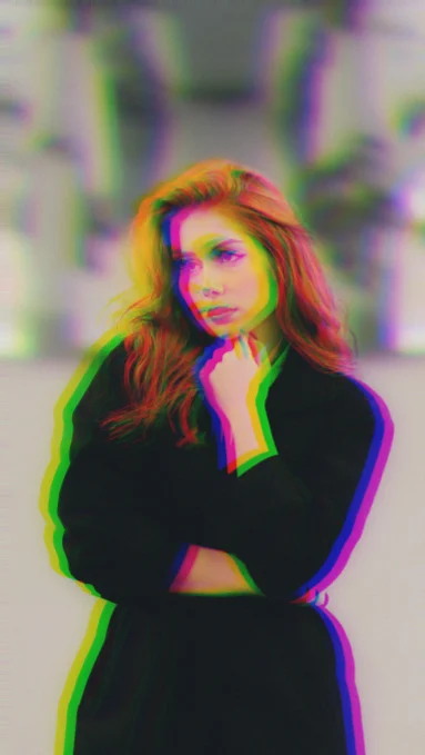 The same portrait with red, green, and blue color layers shifted across the whole picture, her face included