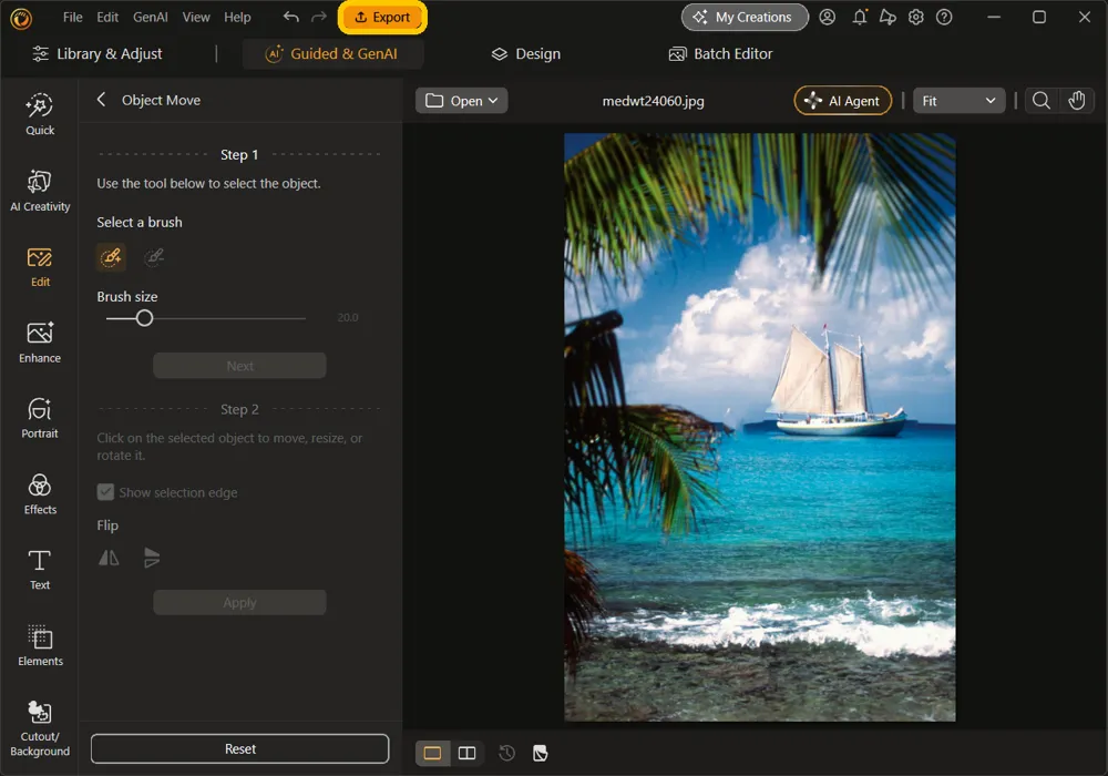 The edited photo with the sailboat in its new spot and the Export button highlighted at the top of the window