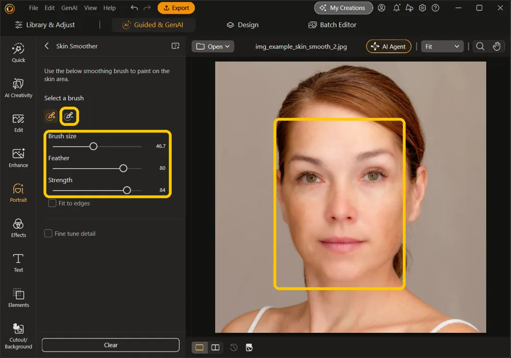 The Brush size, Feather, and Strength sliders at 46.7, 80, and 84, the eraser icon, and the smoothed face on the canvas highlighted
