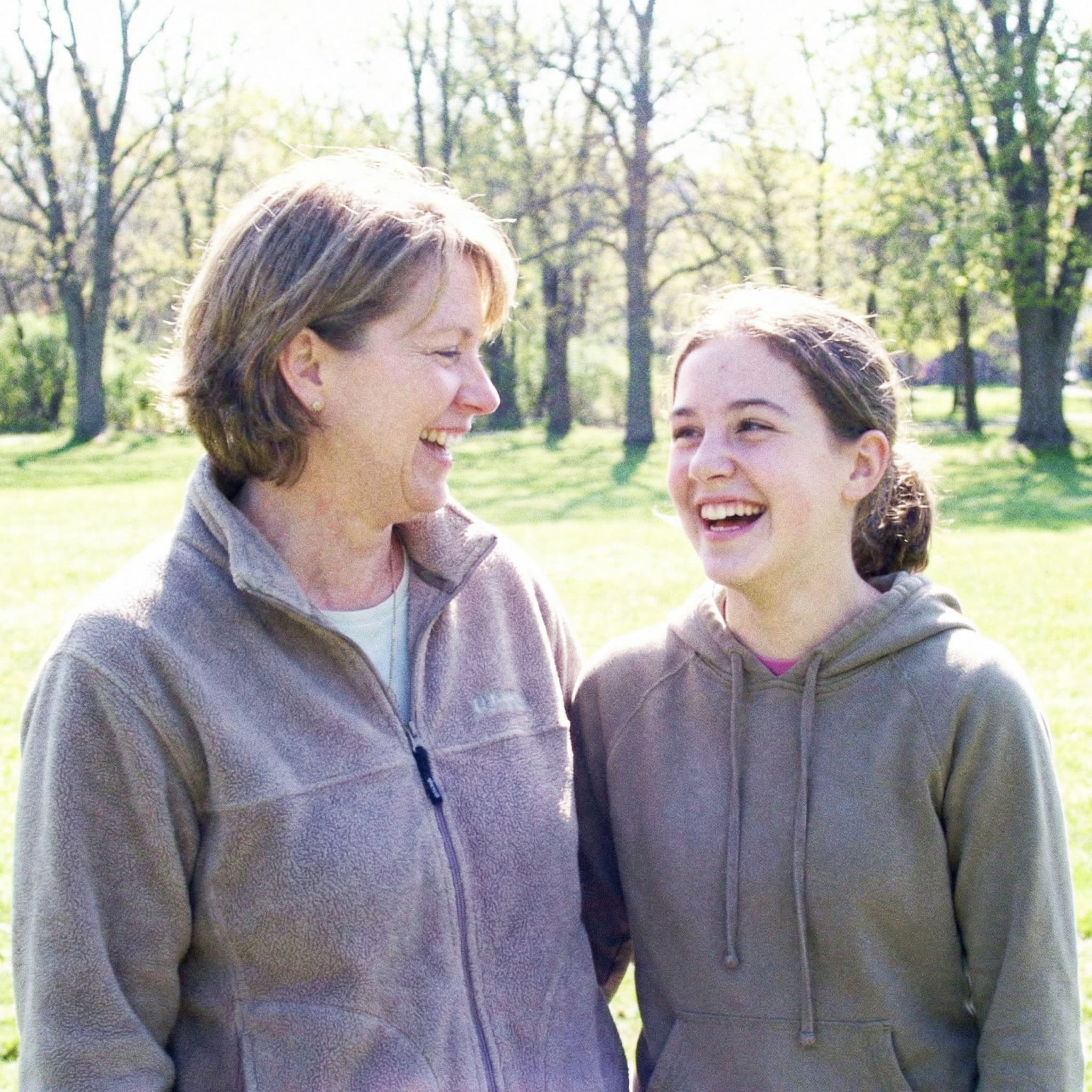 Blurry low-resolution photo of mom before AI enhancement