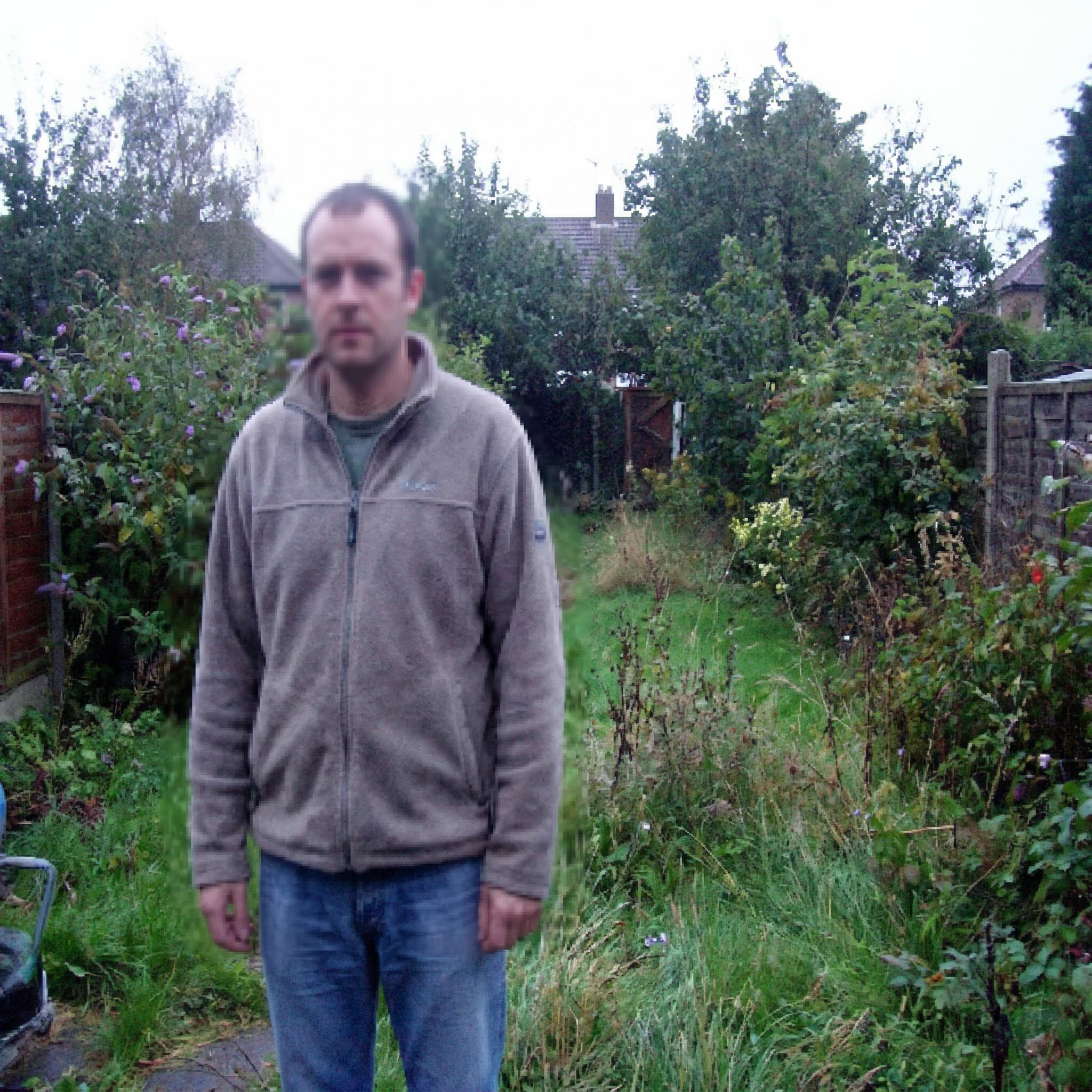 Blurry low-resolution photo of dad before AI enhancement