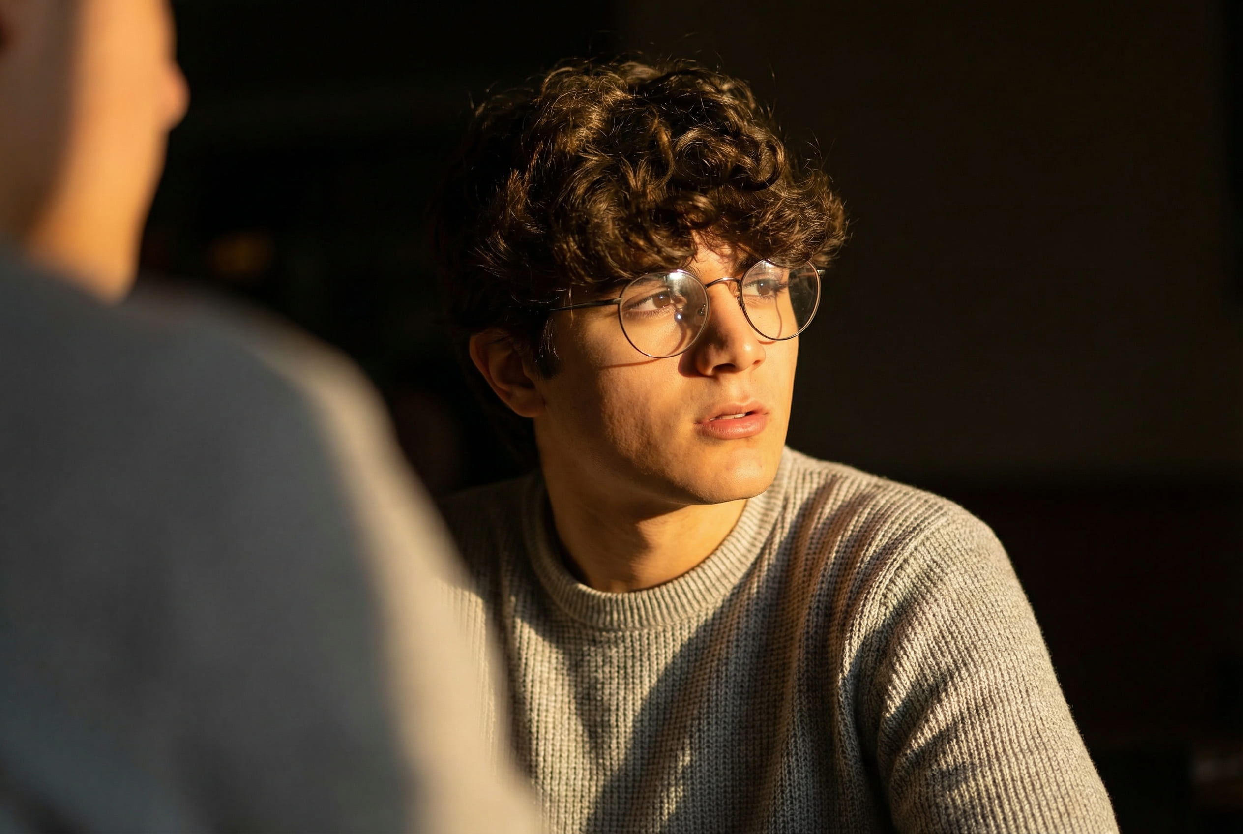 Cinematic low-light portrait with warm lighting